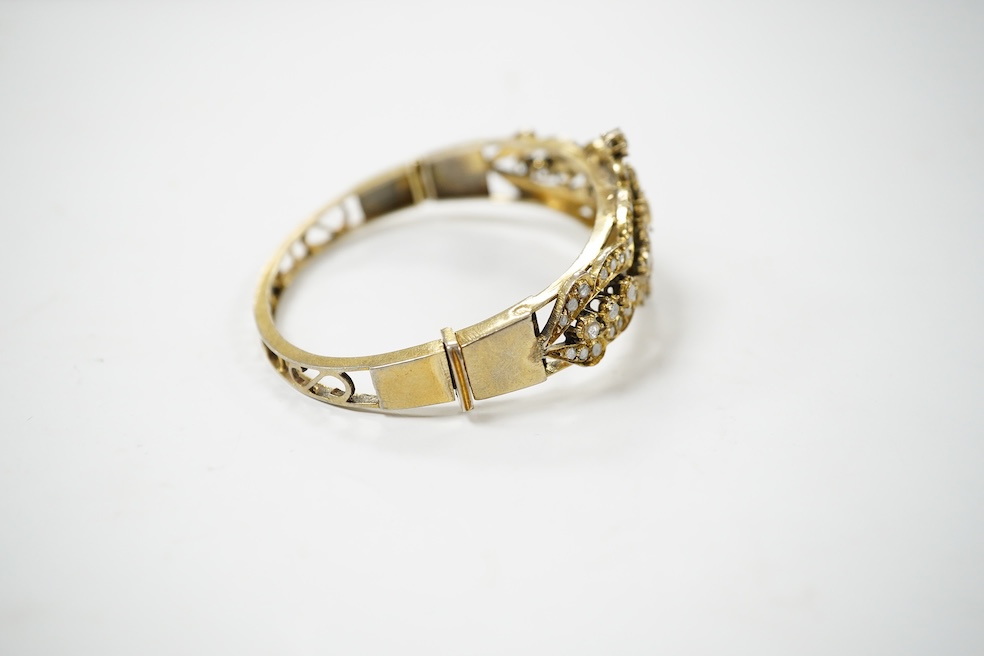 An Indian? gilt white metal and flat and rose cut diamond cluster set hinged bracelet. Condition - poor to fair